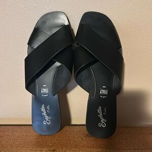 Black leather slides sandals by Seychelles. Made in Italy.
